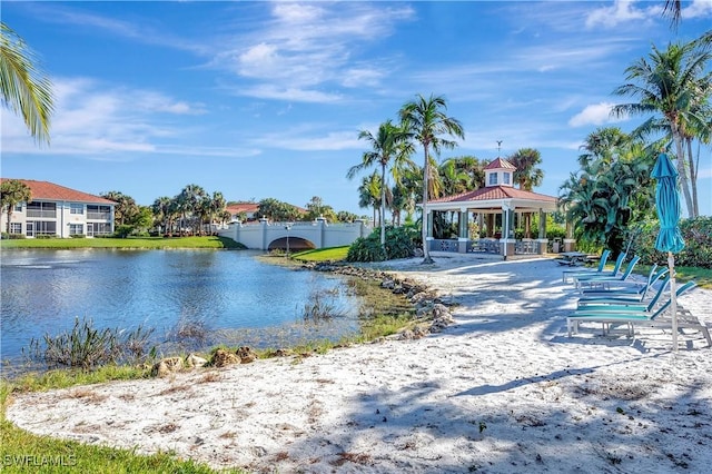 10910 Santa Margherita Rd Unit 101, Estero, FL 34135 - water view with a gazebo and fence