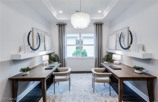 office with ornamental molding, a notable chandelier, a tray ceiling, and wood finished floors