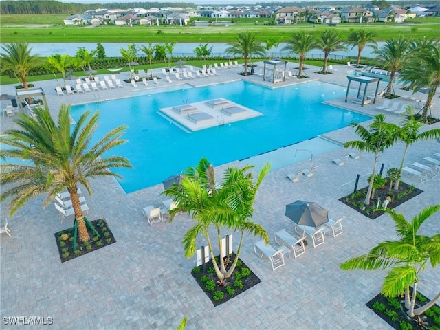 community pool with a patio