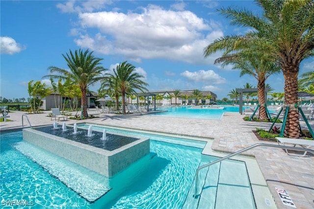 community pool featuring a patio