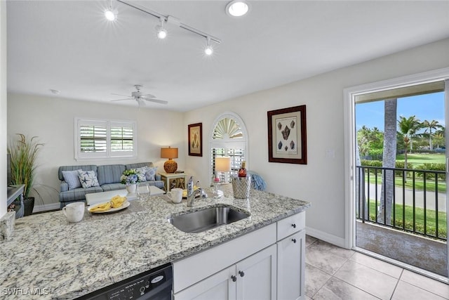 655 8th Ave S Unit 6, Naples, FL 34102 - kitchen featuring a sink, white cabinetry, track lighting, light stone countertops, and black dishwasher