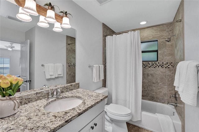 655 8th Ave S Unit 6, Naples, FL 34102 - bathroom featuring shower / tub combo, toilet, vanity, and a ceiling fan