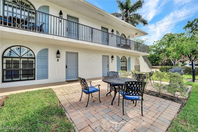 655 8th Ave S Unit 6, Naples, FL 34102 - view of patio / terrace with outdoor dining area and a balcony