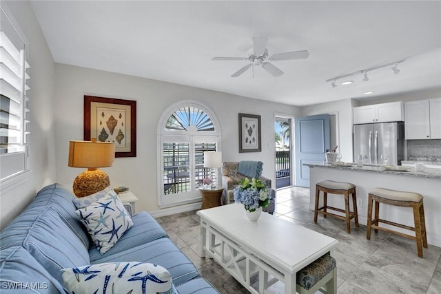 655 8th Ave S Unit 6, Naples, FL 34102 - living area with a ceiling fan and track lighting