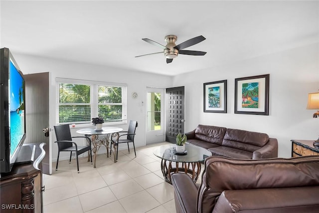 235 Seaview Ct Unit C4, Marco Island, FL 34145 - living area featuring a ceiling fan and light tile patterned floors