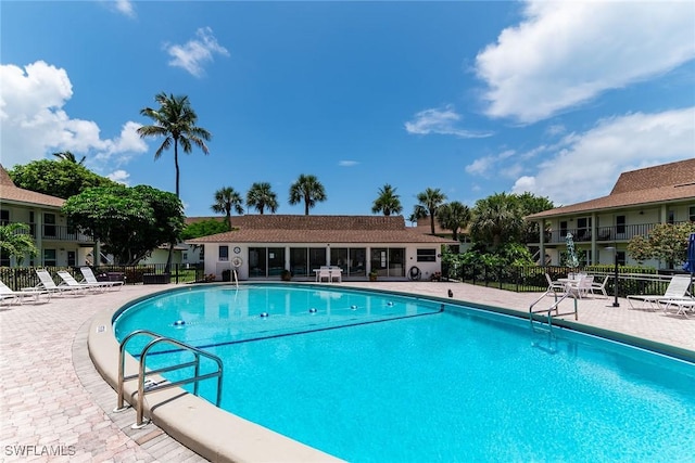 235 Seaview Ct Unit C4, Marco Island, FL 34145 - community pool featuring a patio area