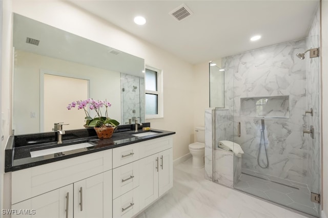 2232 Longboat Dr, Naples, FL 34104 - bathroom featuring marble finish floors, recessed lighting, a marble finish shower, toilet, and double vanity