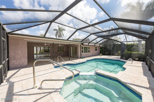 2232 Longboat Dr, Naples, FL 34104 - view of swimming pool featuring a patio, ceiling fan, and a pool with connected hot tub