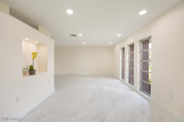 2232 Longboat Dr, Naples, FL 34104 - empty room featuring recessed lighting and baseboards