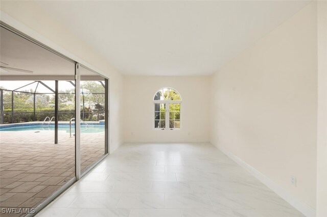 2232 Longboat Dr, Naples, FL 34104 - empty room featuring a sunroom