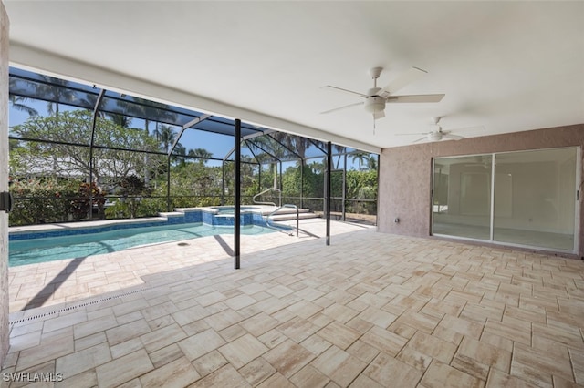 2232 Longboat Dr, Naples, FL 34104 - view of swimming pool featuring a pool with connected hot tub, a ceiling fan, a patio, and a lanai