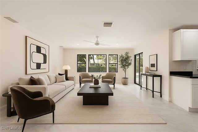 2232 Longboat Dr, Naples, FL 34104 - living area featuring plenty of natural light, a ceiling fan, light tile patterned floors, baseboards, and recessed lighting