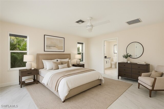 2232 Longboat Dr, Naples, FL 34104 - bedroom featuring connected bathroom, ceiling fan, and baseboards