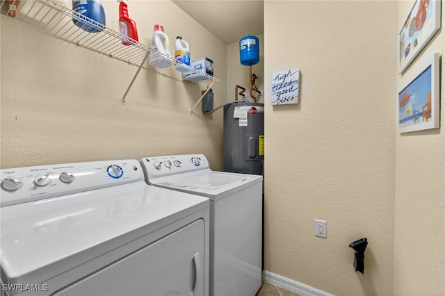 17960 Bonita National Blvd Unit 1716, Bonita Springs, FL 34135 - washroom featuring water heater, washing machine and dryer, and a textured wall