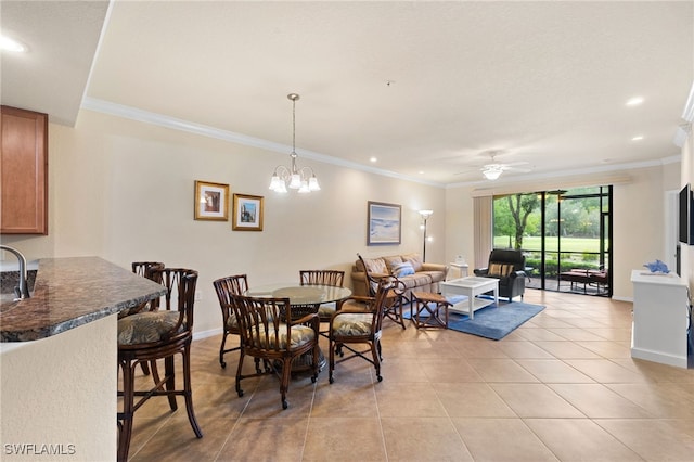 17960 Bonita National Blvd Unit 1716, Bonita Springs, FL 34135 - dining space with crown molding, light tile patterned floors, recessed lighting, ceiling fan, and baseboards