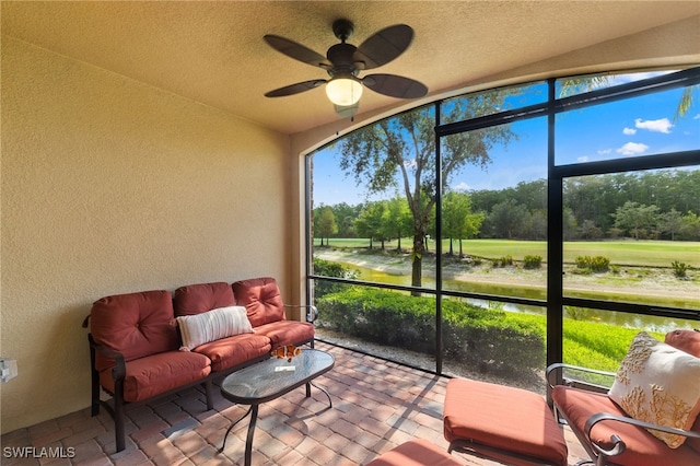 17960 Bonita National Blvd Unit 1716, Bonita Springs, FL 34135 - sunroom / solarium featuring a ceiling fan, view of scattered trees, and a water view