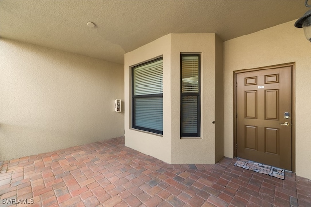 17960 Bonita National Blvd Unit 1716, Bonita Springs, FL 34135 - view of exterior entry with stucco siding