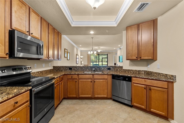 17960 Bonita National Blvd Unit 1716, Bonita Springs, FL 34135 - kitchen with appliances with stainless steel finishes, a sink, ornamental molding, brown cabinets, and recessed lighting