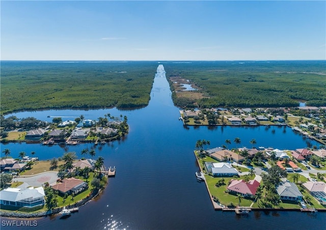 350 Newport Dr Unit 1902, Naples, FL 34114 - aerial view of residential area featuring a large body of water and a forest