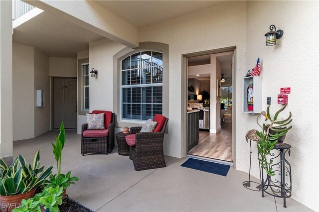 350 Newport Dr Unit 1902, Naples, FL 34114 - entrance to property featuring stucco siding