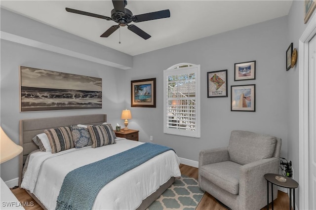 350 Newport Dr Unit 1902, Naples, FL 34114 - bedroom with wood finished floors, baseboards, and ceiling fan