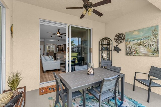 350 Newport Dr Unit 1902, Naples, FL 34114 - view of patio / terrace with ceiling fan and outdoor dining area