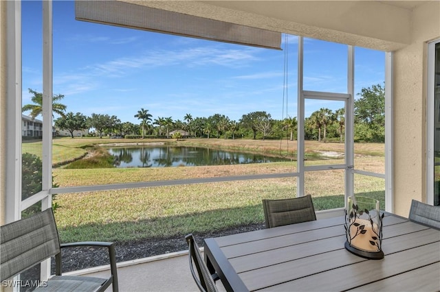 350 Newport Dr Unit 1902, Naples, FL 34114 - sunroom featuring a water view, plenty of natural light, and outdoor dining area