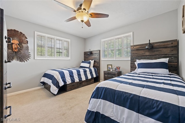 217 W Del Monte Ave, Clewiston, FL 33440 - carpeted bedroom featuring ceiling fan, baseboards, and multiple windows