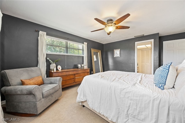 217 W Del Monte Ave, Clewiston, FL 33440 - bedroom with light colored carpet, a ceiling fan, and visible vents