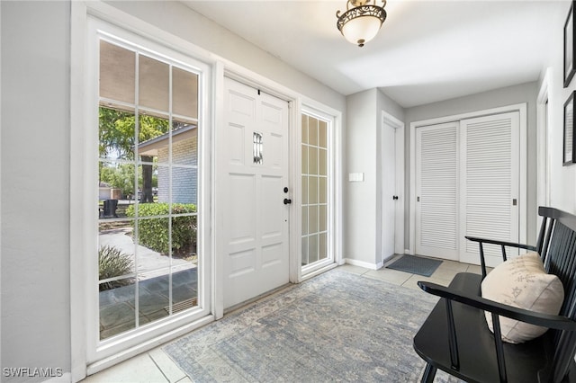 217 W Del Monte Ave, Clewiston, FL 33440 - entrance foyer featuring baseboards and tile patterned floors