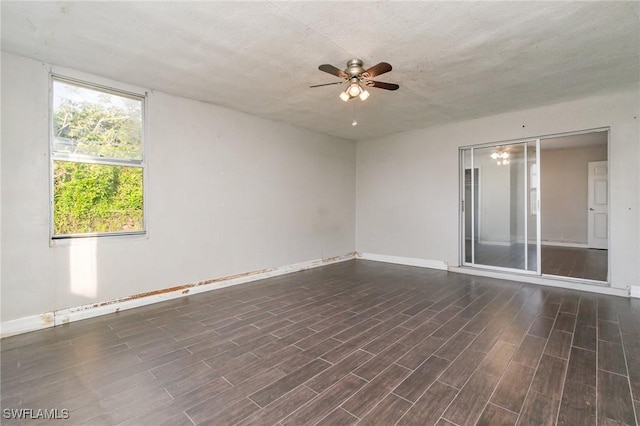 2414 Parkview Dr, Fort Myers, FL 33905 - unfurnished room with ceiling fan, baseboards, and wood finished floors