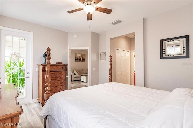 17084 Acapulco Rd Unit 222, Punta Gorda, FL 33955 - bedroom featuring light wood-style flooring, access to outside, ceiling fan, and a closet
