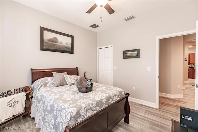 17084 Acapulco Rd Unit 222, Punta Gorda, FL 33955 - bedroom featuring light wood finished floors, a closet, baseboards, and ceiling fan