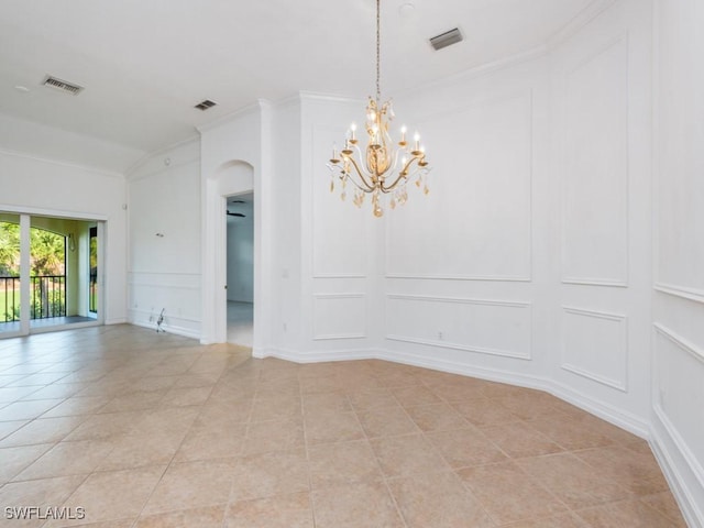 1264 Rialto Way Unit 201, Naples, FL 34114 - unfurnished dining area with visible vents, a decorative wall, crown molding, a chandelier, and arched walkways
