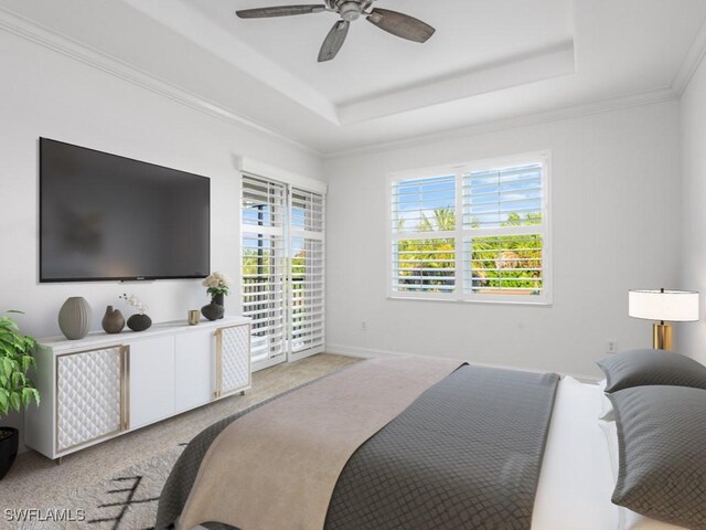 1264 Rialto Way Unit 201, Naples, FL 34114 - bedroom featuring ornamental molding, light carpet, a raised ceiling, and ceiling fan