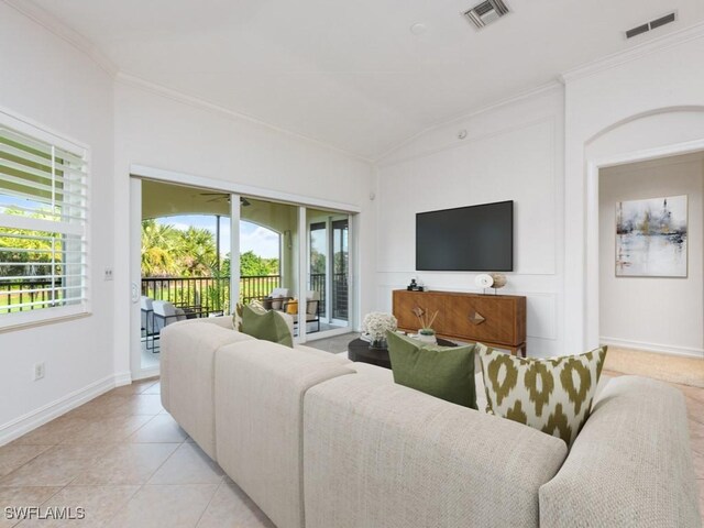 1264 Rialto Way Unit 201, Naples, FL 34114 - living area with ornamental molding, a wealth of natural light, and visible vents