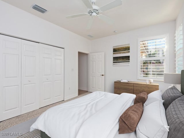 1264 Rialto Way Unit 201, Naples, FL 34114 - bedroom featuring a closet, visible vents, and a ceiling fan