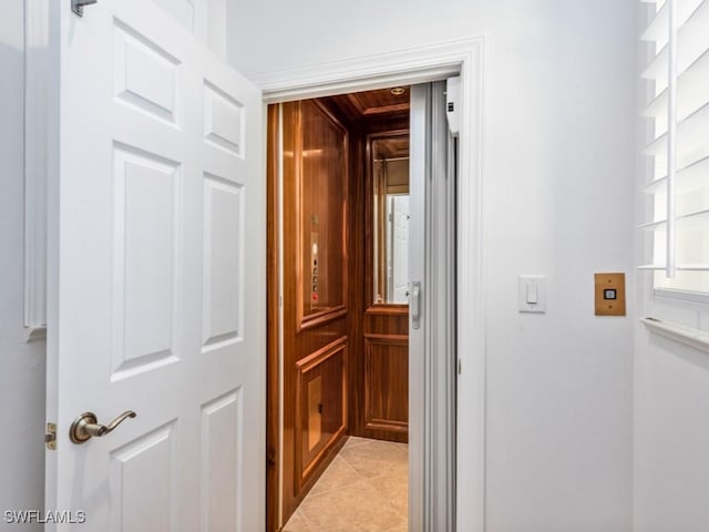 1264 Rialto Way Unit 201, Naples, FL 34114 - hall featuring light tile patterned flooring