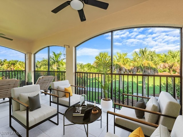 1264 Rialto Way Unit 201, Naples, FL 34114 - sunroom featuring a ceiling fan and outdoor lounge area