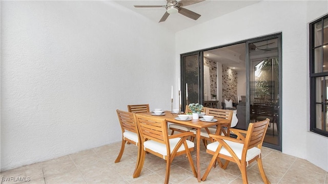 10733 Mirasol Dr Unit 607, Miromar Lakes, FL 33913 - dining space with ceiling fan and light tile patterned floors