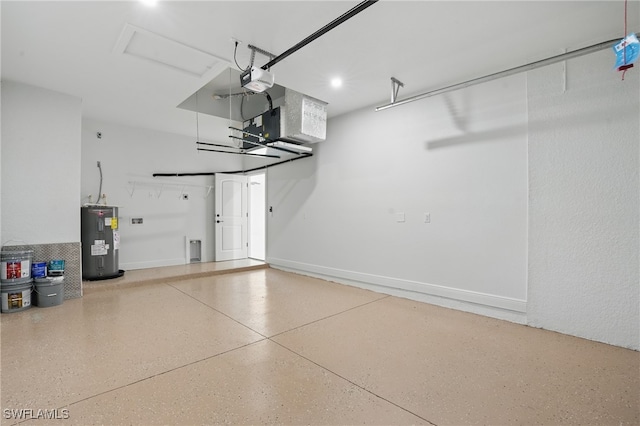 garage featuring water heater and a garage door opener