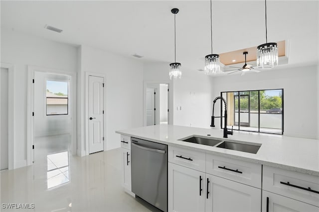 kitchen featuring dishwasher, a sink, a chandelier, white cabinetry, and pendant lighting