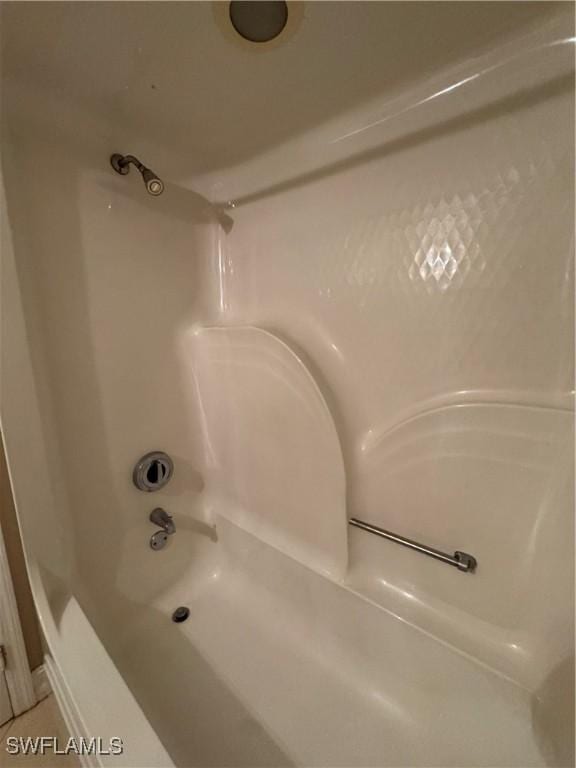 388 Belina Dr Unit 6, Naples, FL 34104 - bathroom featuring bathtub / shower combination