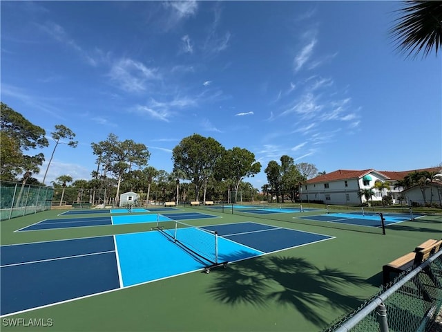 388 Belina Dr Unit 6, Naples, FL 34104 - view of tennis court featuring fence and community basketball court