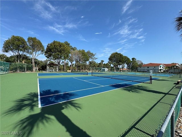 388 Belina Dr Unit 6, Naples, FL 34104 - view of sport court with fence