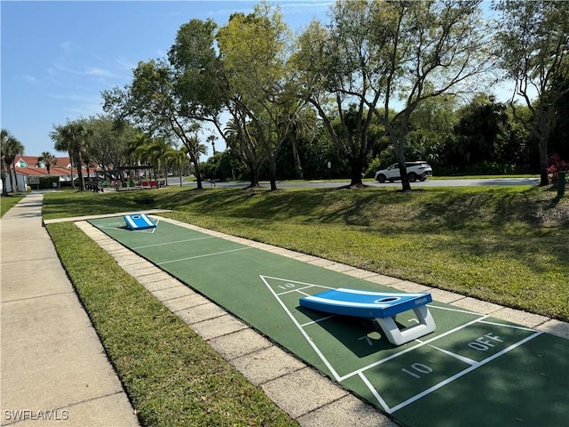 388 Belina Dr Unit 6, Naples, FL 34104 - surrounding community featuring a yard, uncovered parking, and shuffleboard