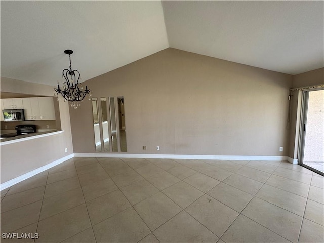 388 Belina Dr Unit 6, Naples, FL 34104 - interior space featuring lofted ceiling, a notable chandelier, baseboards, and light tile patterned floors