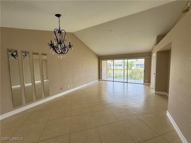 388 Belina Dr Unit 6, Naples, FL 34104 - empty room featuring a chandelier, lofted ceiling, baseboards, and light tile patterned floors