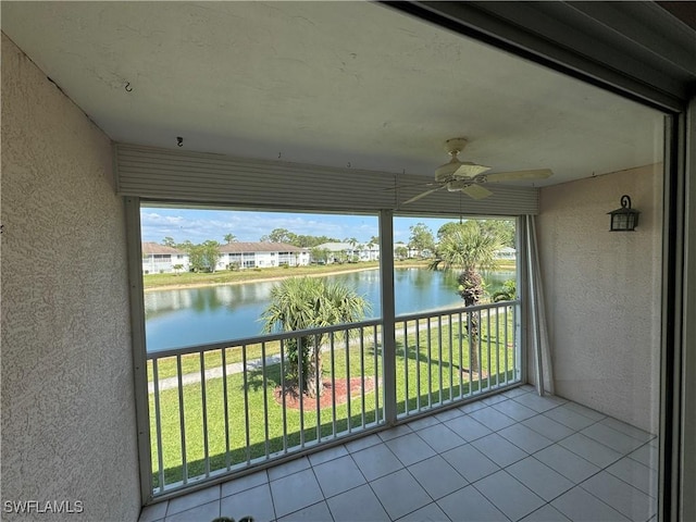 388 Belina Dr Unit 6, Naples, FL 34104 - balcony with a water view and ceiling fan