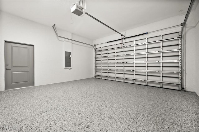 3631 68th Ave NE, Naples, FL 34120 - garage featuring electric panel and a garage door opener